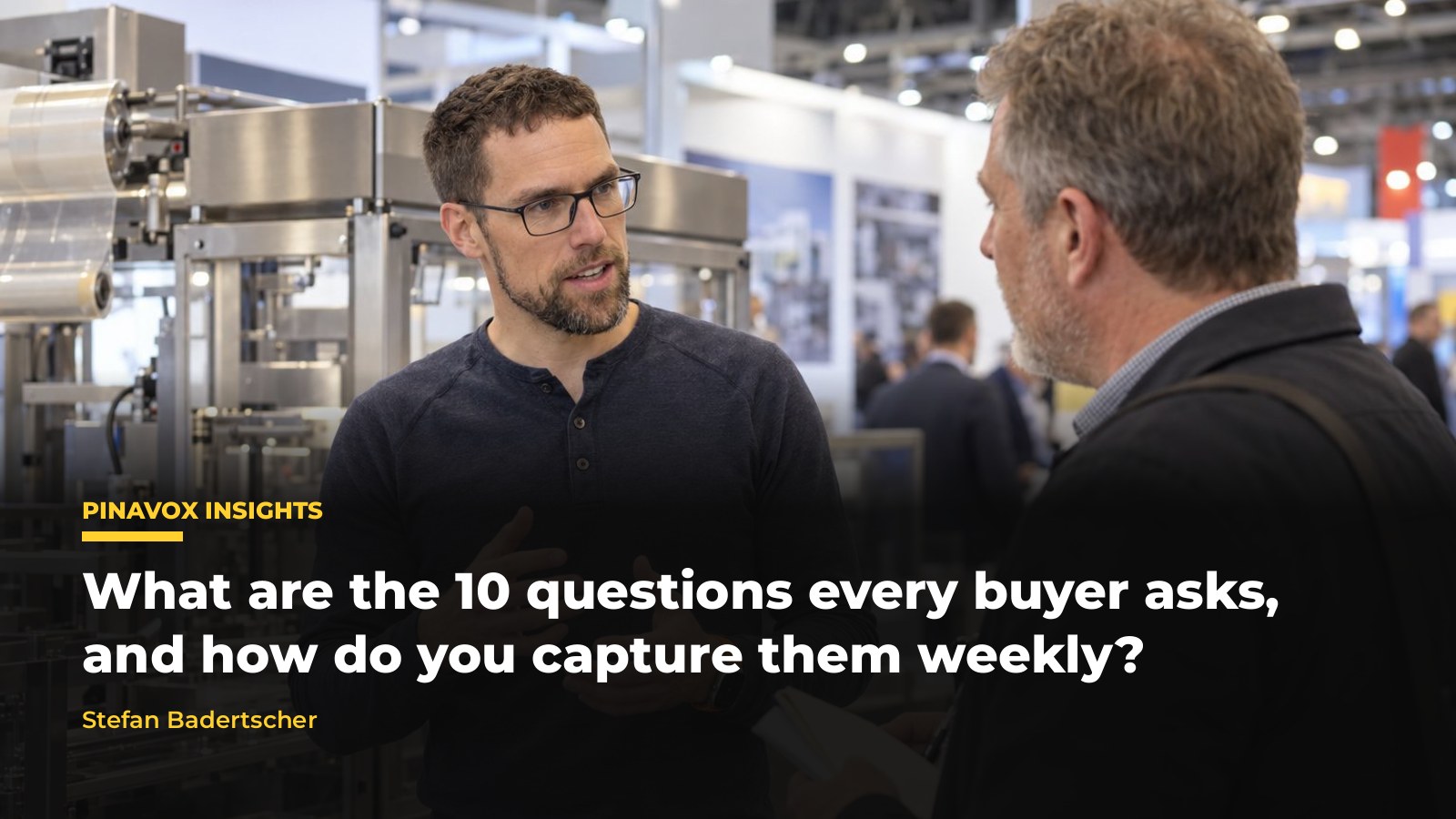 Stefan Badertscher answering a buyer's question at a trade show booth in front of a packaging machine, with the article title